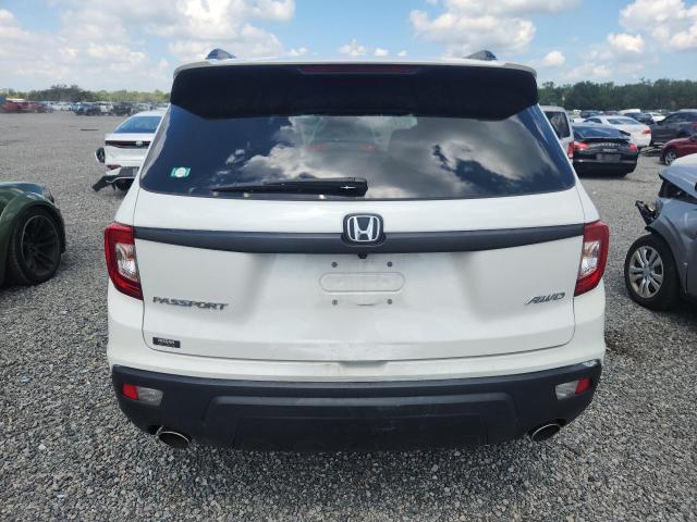 Photo 6 from auction – 2021 HONDA PASSPORT with VIN 5FNYF8H52MB007555