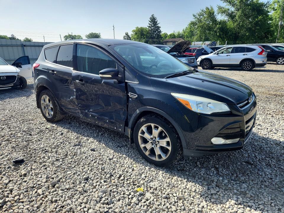 Photo 4 from auction – 2013 FORD ESCAPE with VIN 1FMCU9H96DUA17324