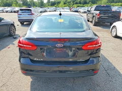Foto 6 de la subasta – 2016 FORD FOCUS con VIN 1FADP3F24GL359048