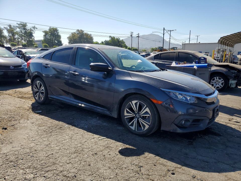 Photo 4 from auction – 2018 HONDA CIVIC with VIN JHMFC1F35JX014332