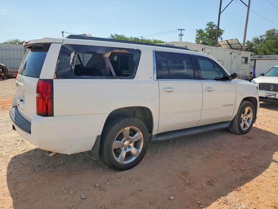 Photo 3 from auction – 2016 CHEVROLET SUBURBAN with VIN 1GNSKHKC9GR302795