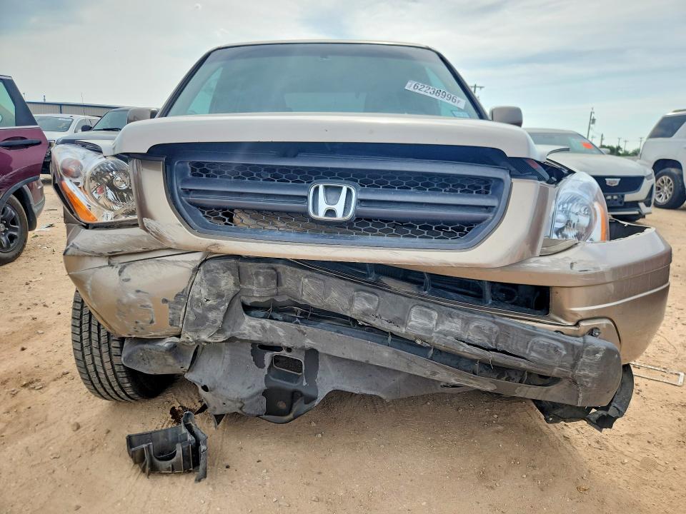 Photo 5 from auction – 2004 HONDA PILOT with VIN 2HKYF18584H580811