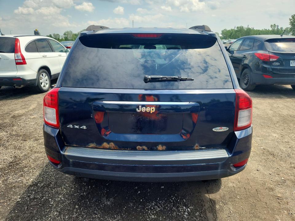 Photo 6 from auction – 2014 JEEP COMPASS with VIN 1C4NJDAB4ED566155