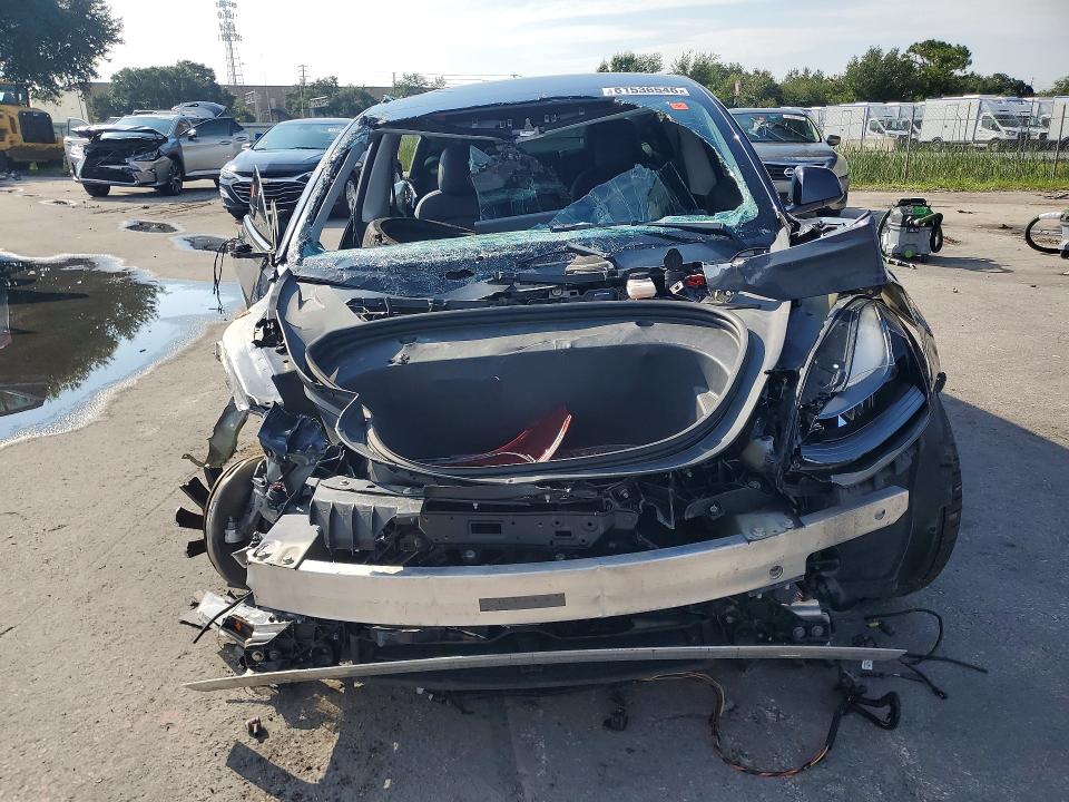 Photo 5 from auction – 2022 TESLA MODEL 3 with VIN 5YJ3E1ECXNF277514