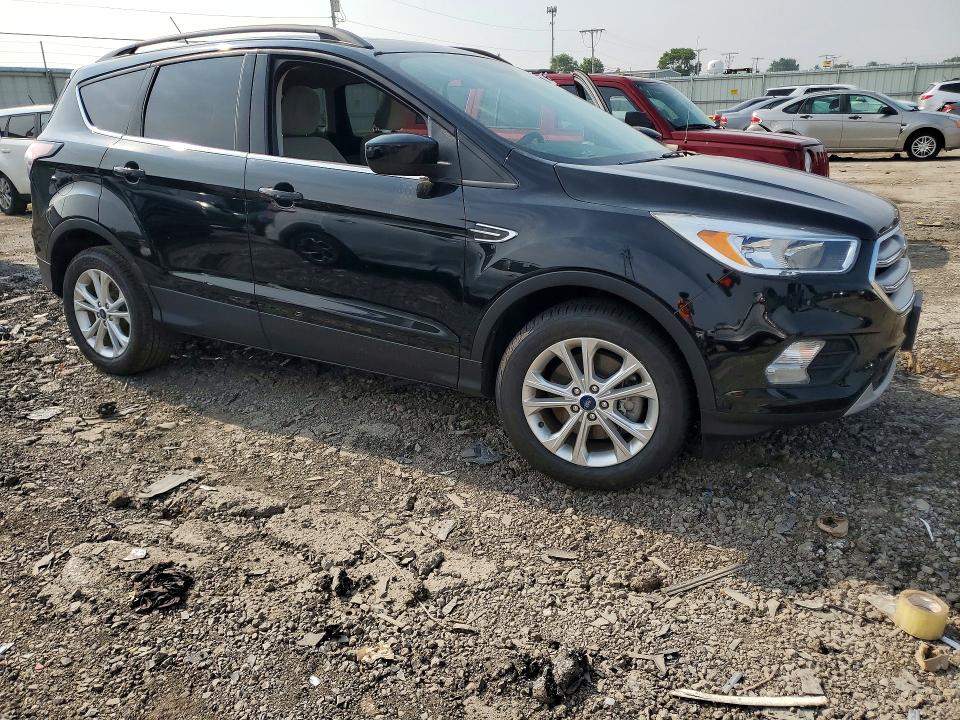 Photo 4 from auction – 2018 FORD ESCAPE with VIN 1FMCU9GD1JUC60086