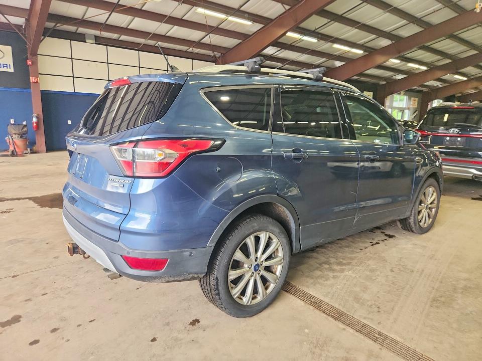 Photo 3 from auction – 2018 FORD ESCAPE with VIN 1FMCU9J92JUA66963