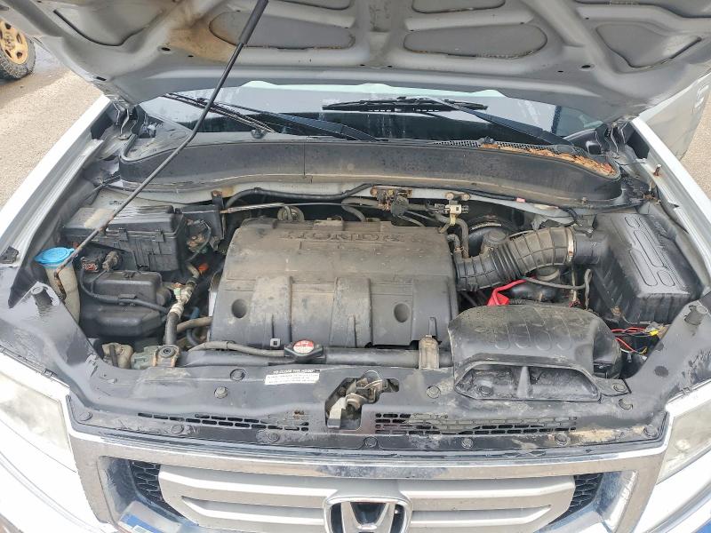 Photo 11 from auction – 2010 HONDA RIDGELINE with VIN 5FPYK1F58AB503808