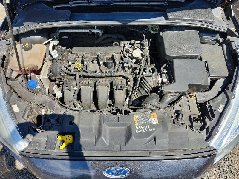 Photo 11 from auction – 2016 FORD FOCUS with VIN 1FADP3F28GL347016