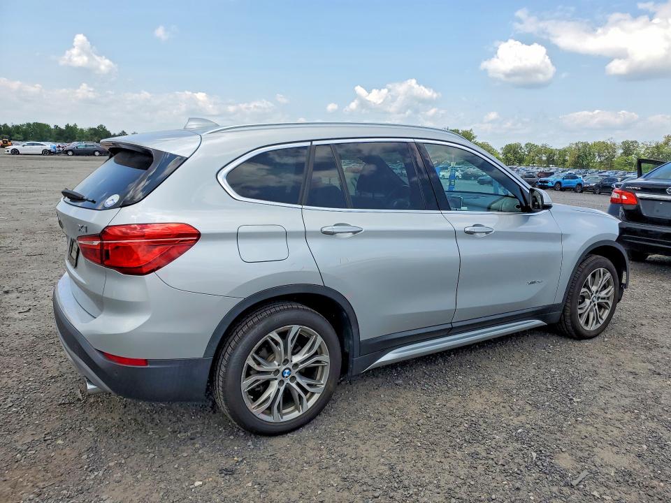 Photo 3 from auction – 2017 BMW X1 with VIN WBXHT3Z31H4A57942