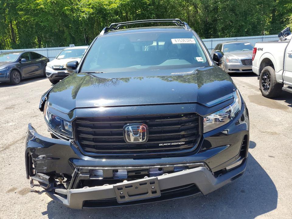 Photo 5 from auction – 2023 HONDA RIDGELINE with VIN 5FPYK3F88PB021581