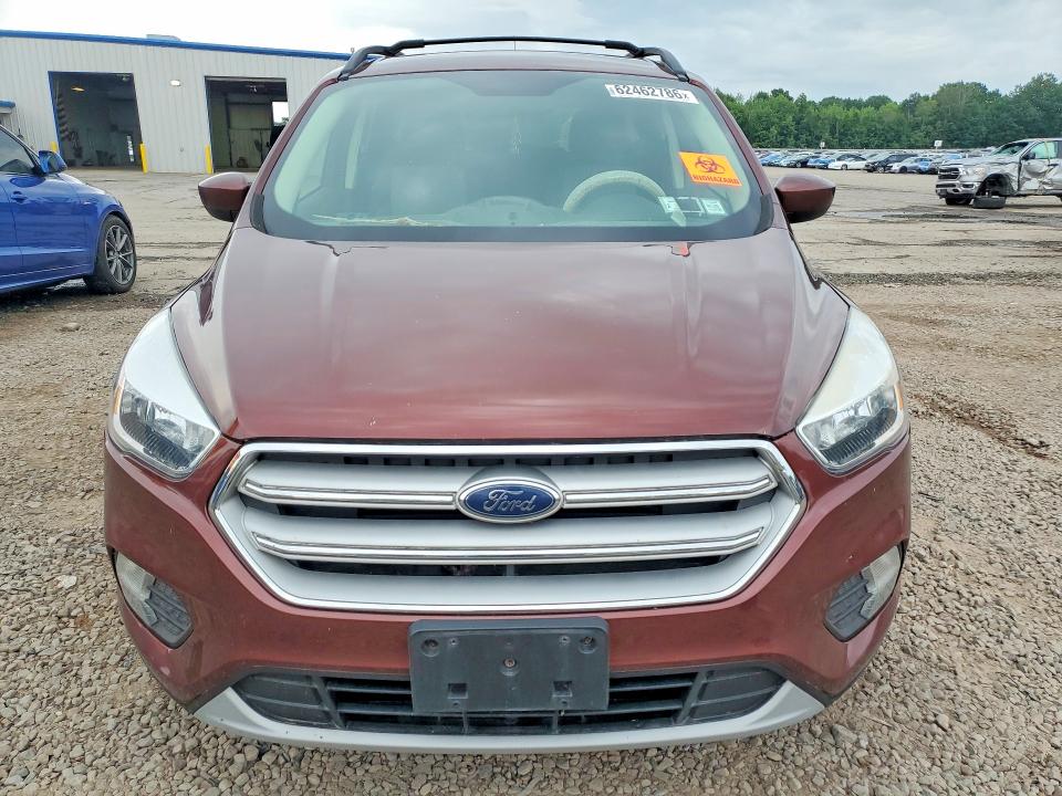 Photo 5 from auction – 2018 FORD ESCAPE with VIN 1FMCU9GD2JUC84395