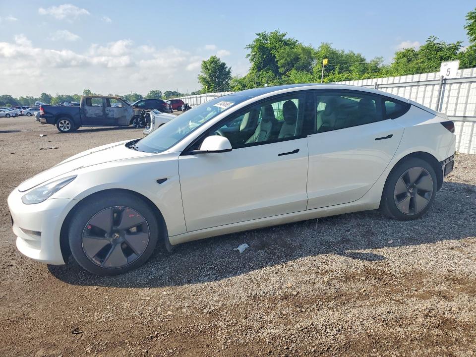 TESLA MODEL 3 2023 with VIN LRW3E1FA5PC875956 - Photo from auction