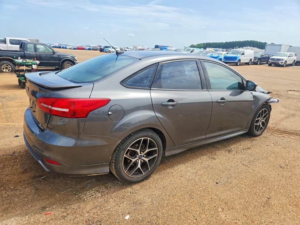 Photo 3 from auction – 2015 FORD FOCUS with VIN 1FADP3F20FL268793