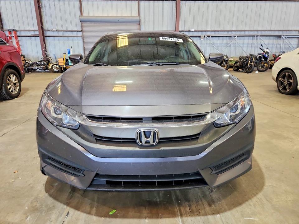 Photo 5 from auction – 2016 HONDA CIVIC with VIN 19XFC2F58GE060738