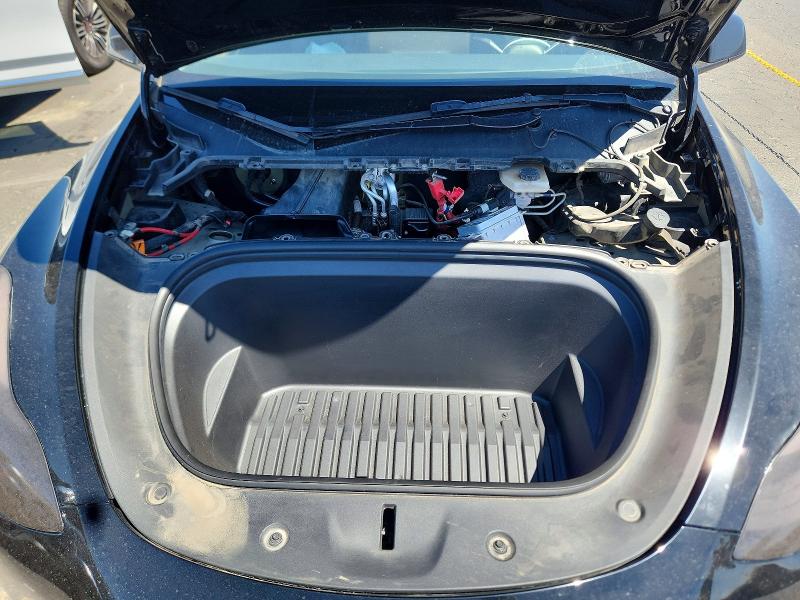Photo 11 from auction – 2023 TESLA MODEL Y with VIN 7SAYGDEF2PF595175