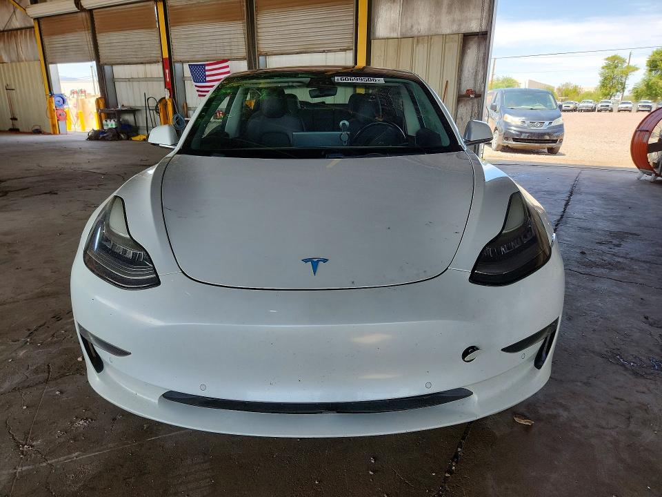 Photo 5 from auction – 2018 TESLA MODEL 3 with VIN 5YJ3E1EA2JF040248