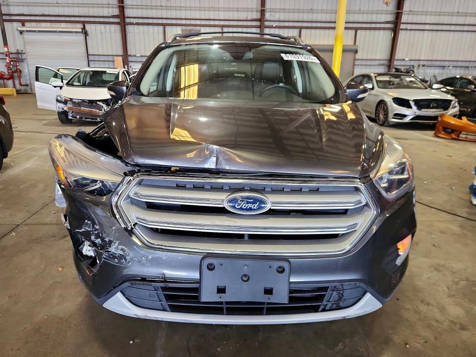 Photo 5 from auction – 2018 FORD ESCAPE with VIN 1FMCU0J93JUC32211