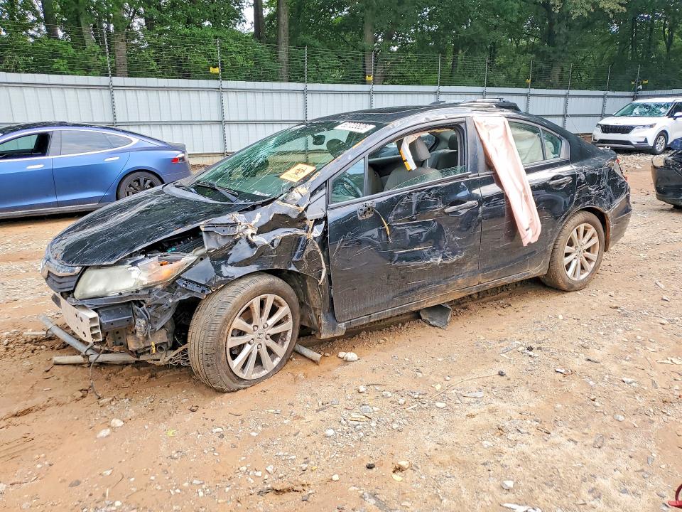HONDA CIVIC 2012 with VIN 2HGFB2F94CH307971 - Photo from auction