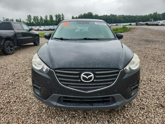 Photo 5 from auction – 2016 MAZDA CX-5 with VIN JM3KE2BY1G0895685
