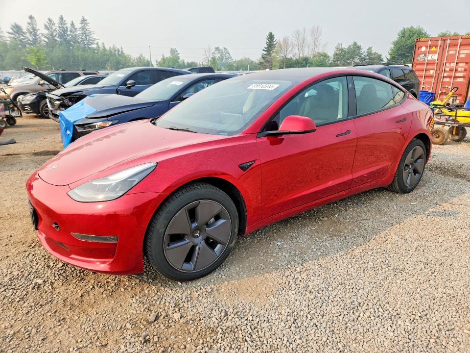 TESLA MODEL 3 2022 with VIN 5YJ3E1EA6NF320714 - Photo from auction