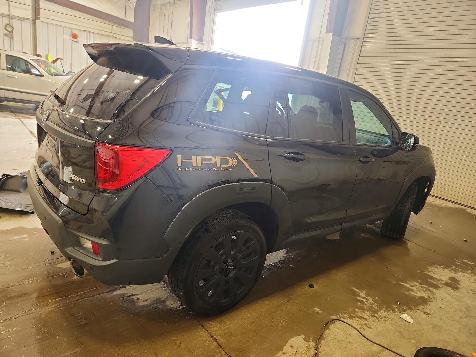 Photo 3 from auction – 2023 HONDA PASSPORT with VIN 5FNYF8H50PB033012