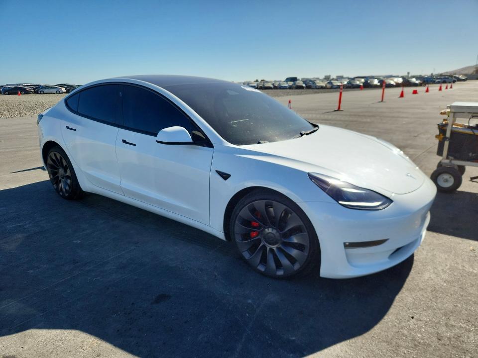 Photo 4 from auction – 2021 TESLA MODEL 3 with VIN 5YJ3E1EC4MF876245