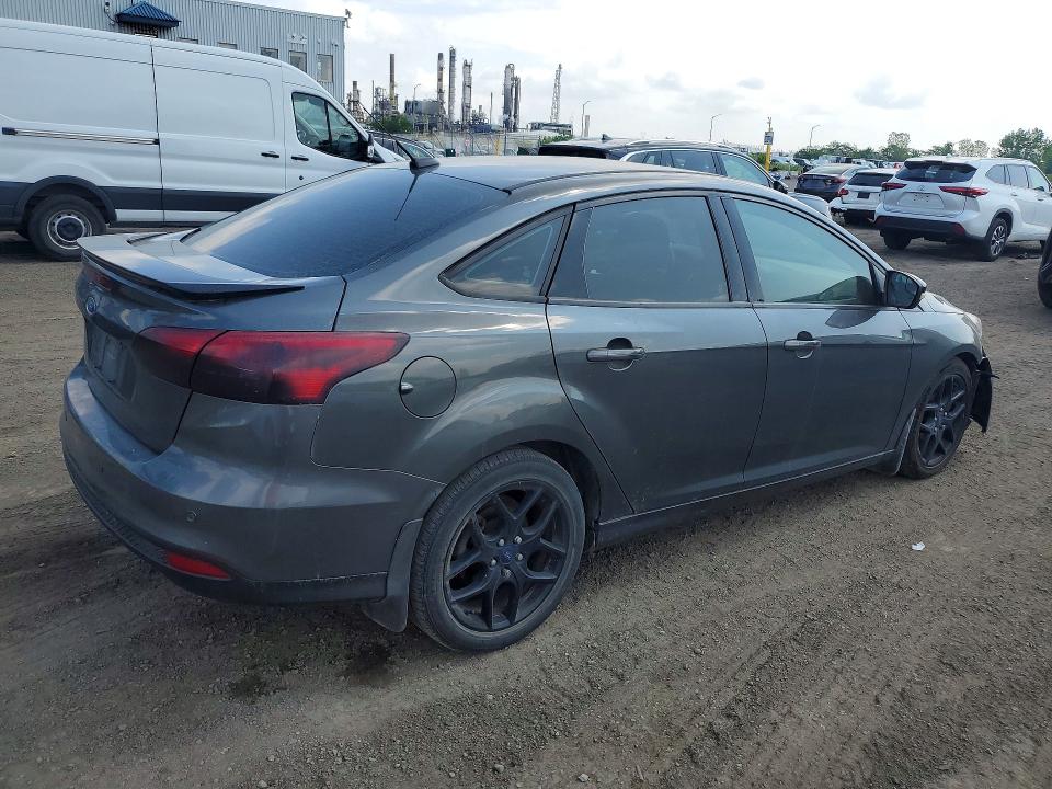 Снимка 3 от търг – 2017 FORD FOCUS с VIN 1FADP3H24HL236283