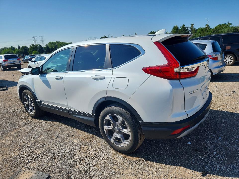 Photo 2 from auction – 2019 HONDA CR-V with VIN 7FARW2H52KE021295