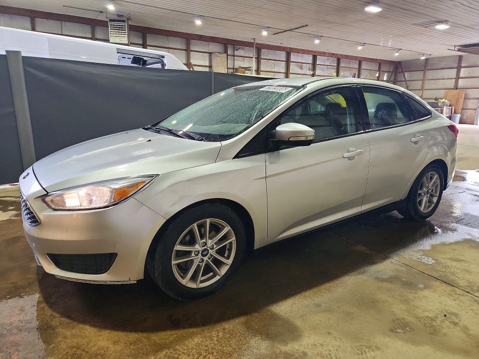 FORD FOCUS 2018 with VIN 1FADP3FE1JL320208 - Photo from auction