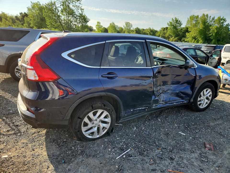 Photo 3 from auction – 2015 HONDA CR-V with VIN 2HKRM4H71FH627905