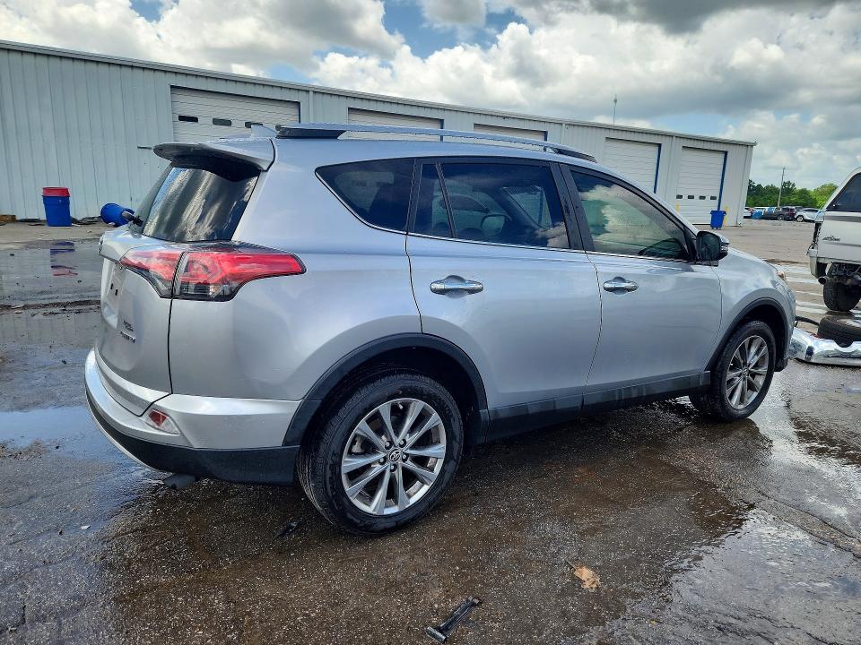 Photo 3 from auction – 2018 TOYOTA RAV4 with VIN JTMYFREV4JJ178435