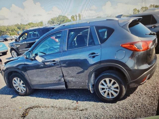 Photo 2 from auction – 2015 MAZDA CX-5 with VIN JM3KE2CYXF0443134