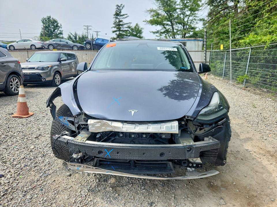 Photo 5 from auction – 2022 TESLA MODEL Y with VIN 7SAYGDEEXNF390983