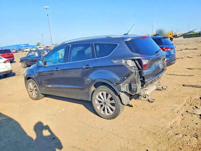 Photo 2 from auction – 2017 FORD ESCAPE with VIN 1FMCU0JD4HUD08436