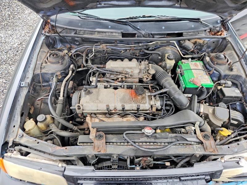 Photo 11 from auction – 1990 MAZDA PROTEGE with VIN JM1BG2246L0169203