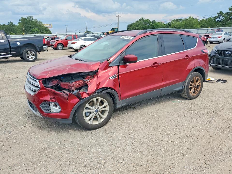 FORD ESCAPE 2018 with VIN 1FMCU0HDXJUB20922 - Photo from auction