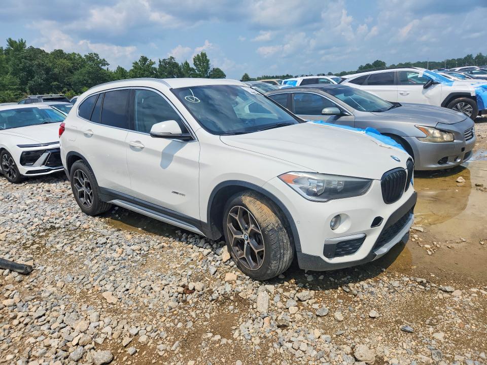 Photo 4 from auction – 2017 BMW X1 with VIN WBXHT3C30H5F68769