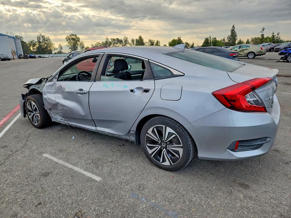 Photo 2 from auction – 2016 HONDA CIVIC with VIN 2HGFC1F31GH644946