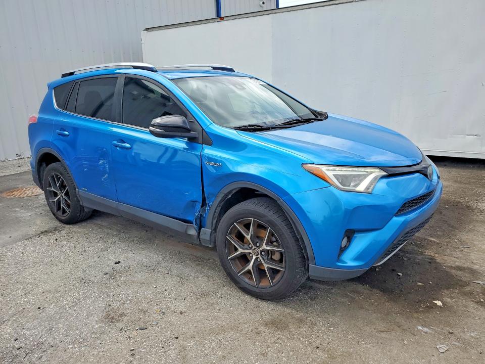 Photo 4 from auction – 2018 TOYOTA RAV4 HV with VIN JTMJJREV5JD170004