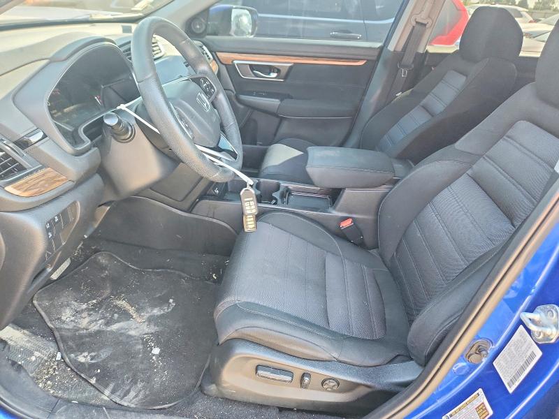 Photo 7 from auction – 2021 HONDA CR-V with VIN 7FARW1H56ME013228