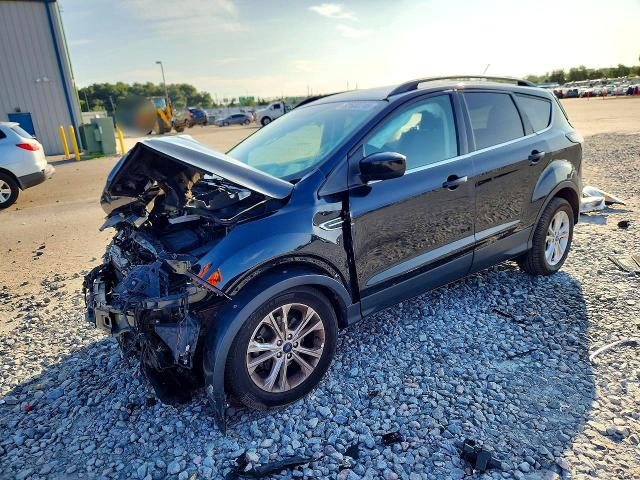 FORD ESCAPE 2018 with VIN 1FMCU0GD1JUA75967 - Photo from auction