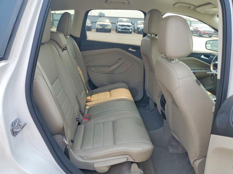 Photo 11 from auction – 2016 FORD ESCAPE with VIN 1FMCU9JX1GUC79717