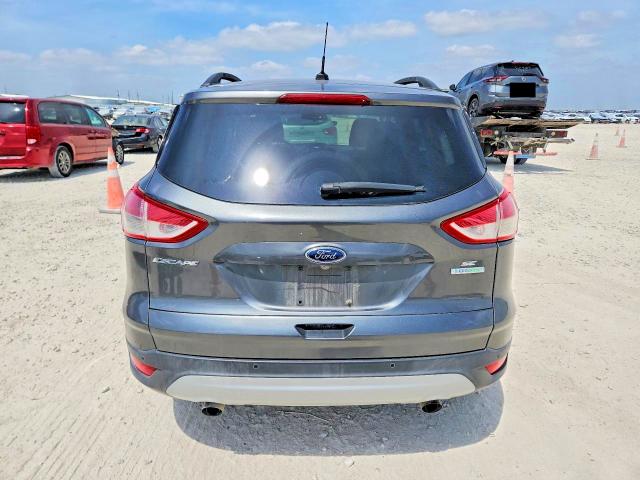 Photo 6 from auction – 2016 FORD ESCAPE with VIN 1FMCU0GX2GUA38719