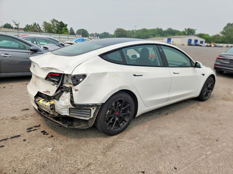 Photo 3 from auction – 2021 TESLA MODEL 3 with VIN 5YJ3E1EA6MF030990