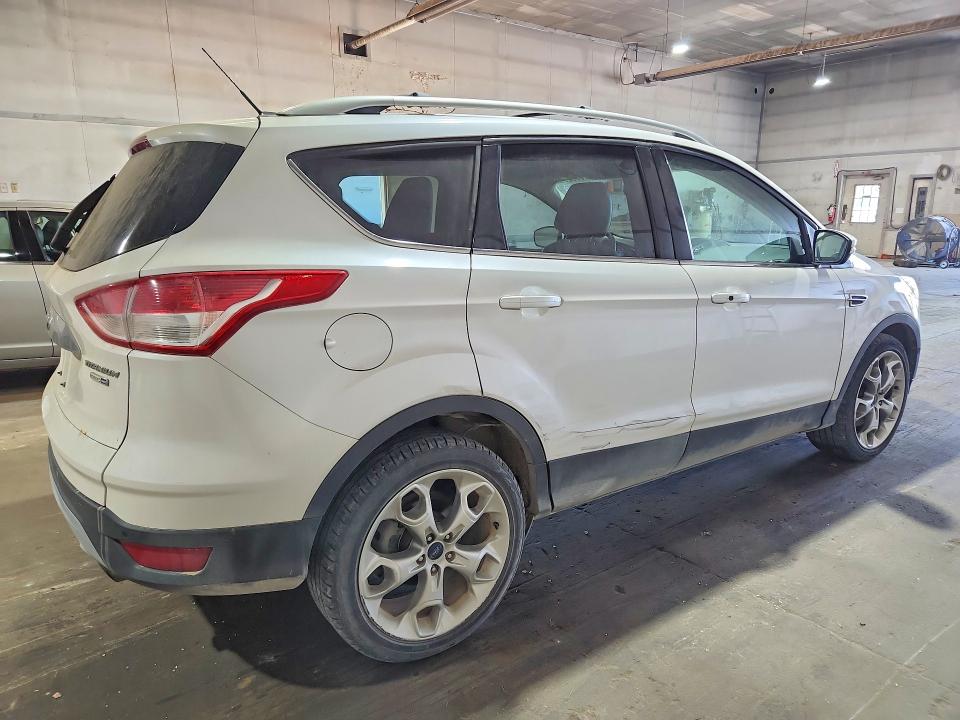 Photo 3 from auction – 2016 FORD ESCAPE with VIN 1FMCU9J99GUA37551