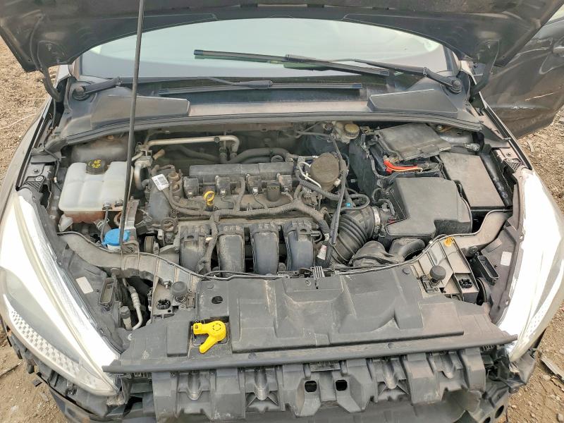 Photo 11 from auction – 2015 FORD FOCUS with VIN 1FADP3F20FL268647