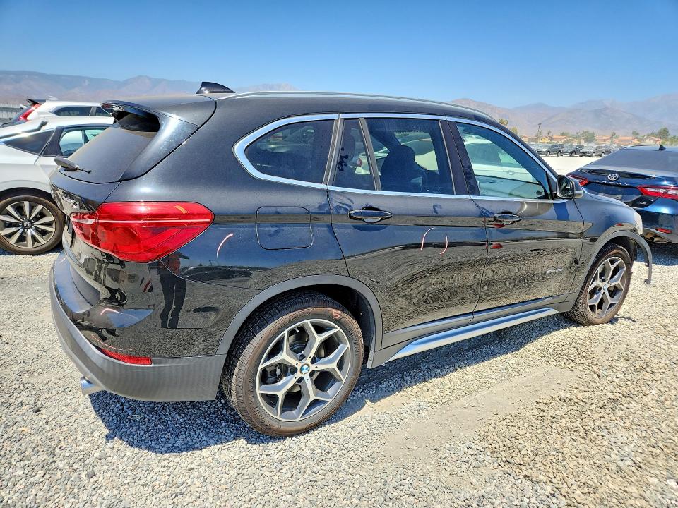 Photo 3 from auction – 2018 BMW X1 with VIN WBXHU7C34J5H40666