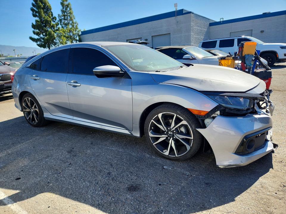 Photo 4 from auction – 2021 HONDA CIVIC with VIN 2HGFC2F8XMH541652