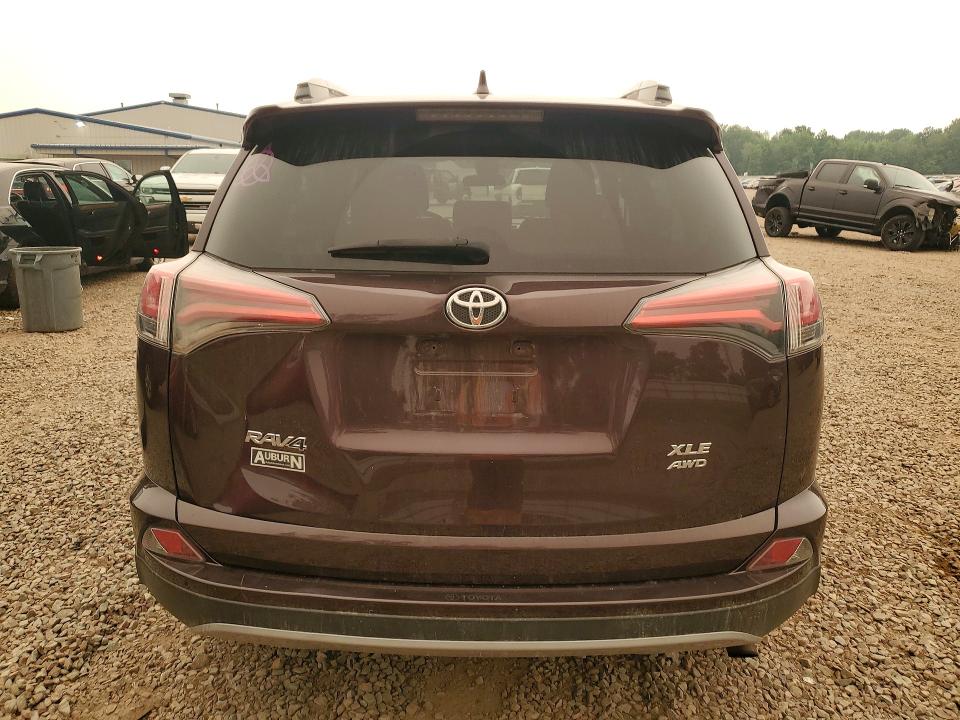 Photo 6 from auction – 2018 TOYOTA RAV4 with VIN 2T3RFREV0JW819473
