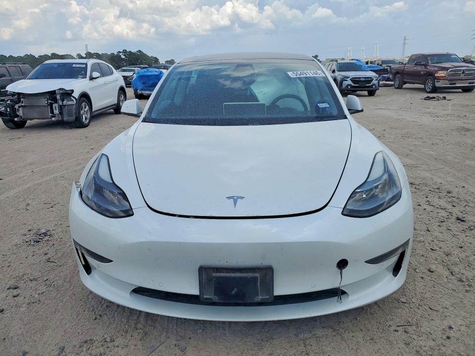 Photo 5 from auction – 2021 TESLA MODEL 3 with VIN 5YJ3E1EA4MF988929